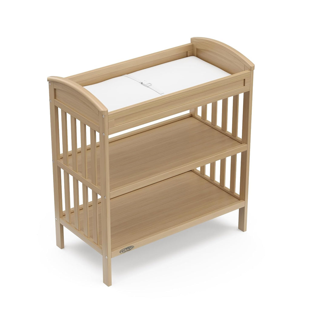 Graco Benton Changing Table with Bonus Water-Resistant Changing Pad (Driftwood) - GREENGUARD Gold Certified, Includes Diaper Change Pad with Safety Strap, 2 Open Storage Shelves for Organizing