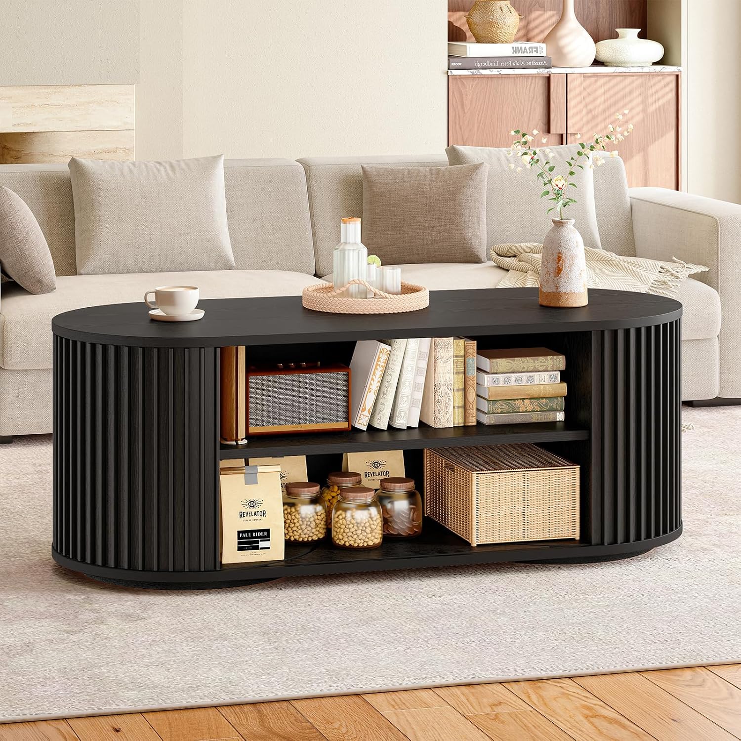 ONBRILL 47' Multi-Functional Coffee Table with Storage, Oval Coffee Table with Vertical Striped Sliding Door & Round Base, Mid-Century Modern Center Table with Adjustable Shelf for Living Room, Black