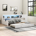 LUMISOL Full Size Corner Bed with Storage Shelves & Trundle, Wooden L-Shaped Day Bed Frame with Charging Station & LED Lighting for Living Room or Guestroom, White