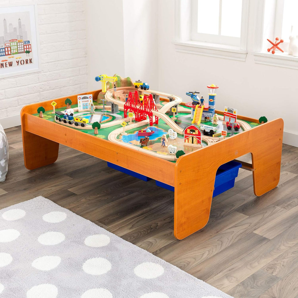 KidKraft Ride Around Town Wooden Train Set and Table with Helicopter, Airplane, Farm, Storage Bins and 100 Pieces, Compatible with Other Major Brand Trains, Honey