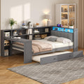 Merax Multifunctional Twin Size Daybed with Trundle, Built-in Desk, Wood Corner Bed with 8 Storage Shelves, Charging Station, and Upholstered Headboard, Grey