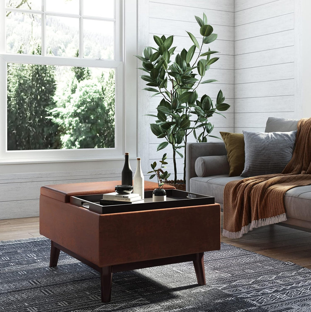 SIMPLIHOME Owen Tray Top Small Coffee Table Storage Ottoman - 34 inch Wide Upholstered Vegan Leather Rectangular Flip-Top Ottoman in Distressed Saddle Brown, Mid-Century Modern Ottoman for Living Room