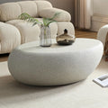WILLIAMSPACE 43.3' Oval Coffee Table with Grainy Rocks Pattern, Modern Irregular Travertine Faux Stone Center Table, Drum Fiberglass Coffee Table Accent Tea Table for Living Room, No Need Assembly